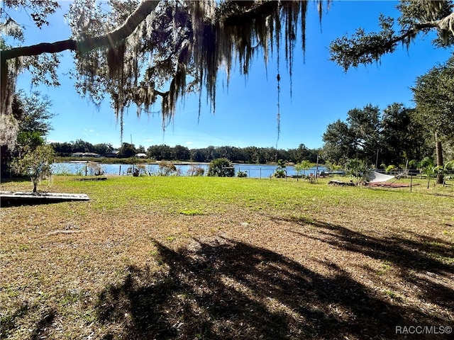 view of yard with a water view