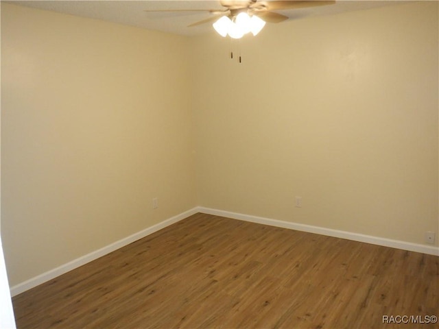 unfurnished room with ceiling fan and hardwood / wood-style floors