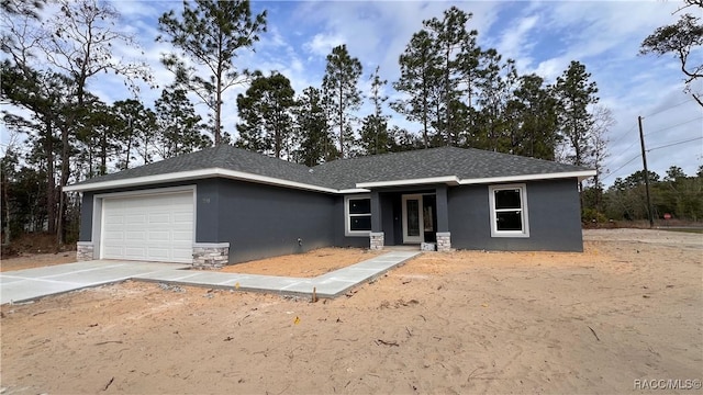 single story home with a garage