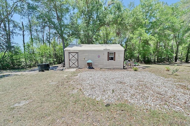 view of outbuilding with an outdoor structure