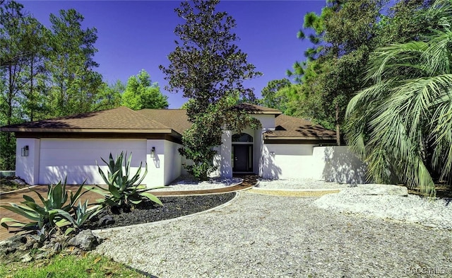 view of front of house with a garage