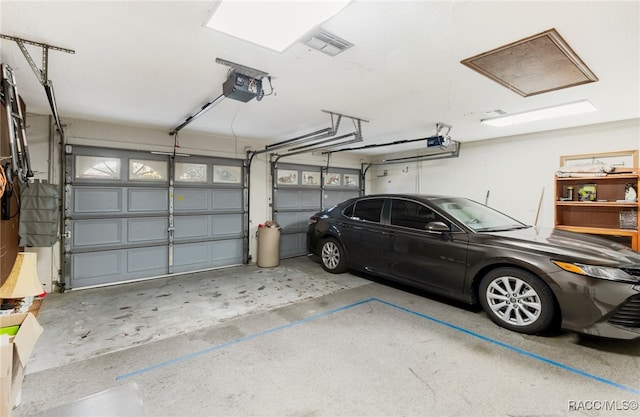 garage with a garage door opener