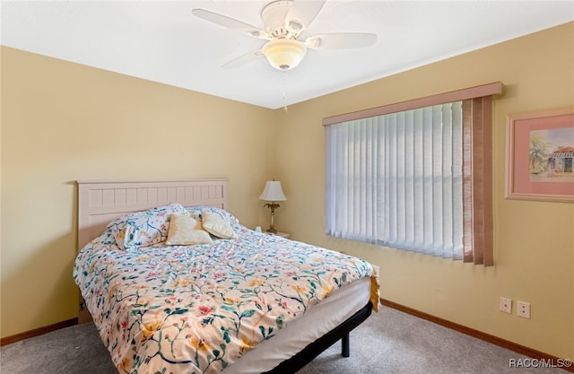 bedroom featuring ceiling fan and carpet floors