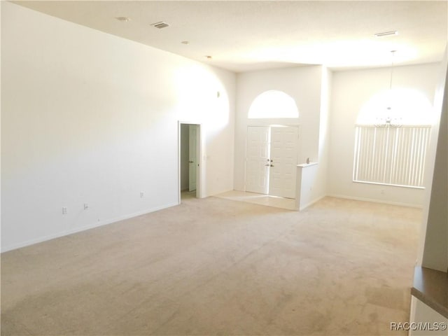 3201 N Canterbury Lake Dr, Hernando, FL 34442 - spare room featuring light carpet and baseboards
