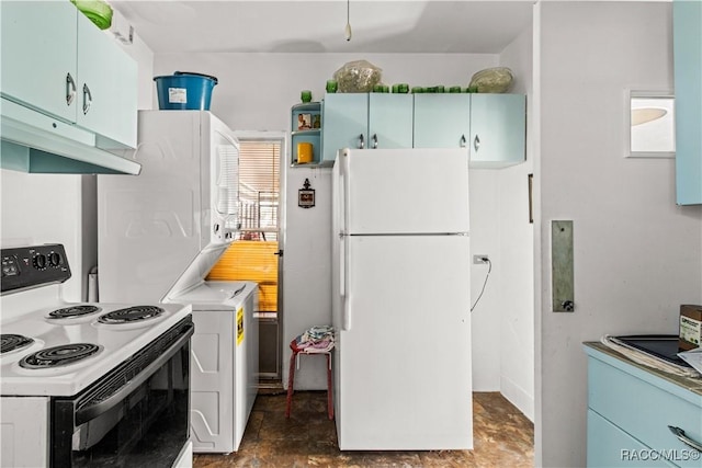 kitchen with under cabinet range hood, range with electric cooktop, light countertops, freestanding refrigerator, and stone finish floor