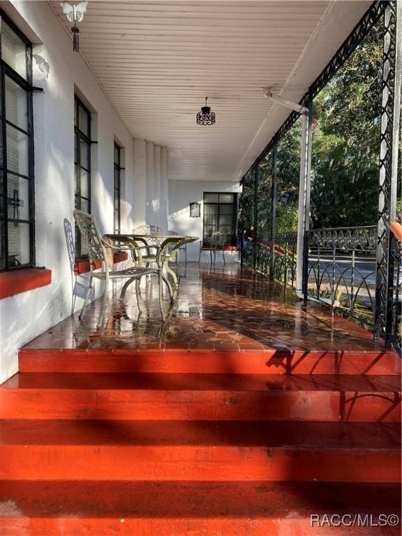 wooden deck featuring a porch