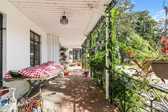 view of patio featuring a porch