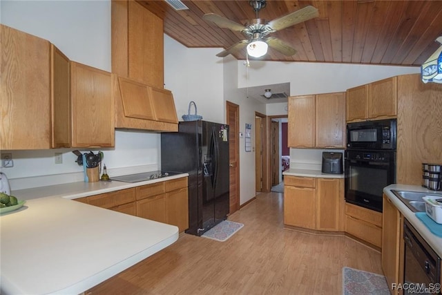 kitchen featuring kitchen peninsula, light hardwood / wood-style floors, vaulted ceiling, black appliances, and wood ceiling