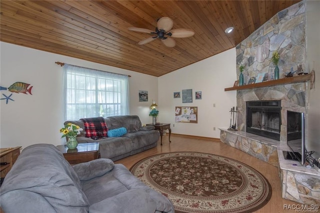 living room with vaulted ceiling, ceiling fan, a fireplace, wood-type flooring, and wood ceiling