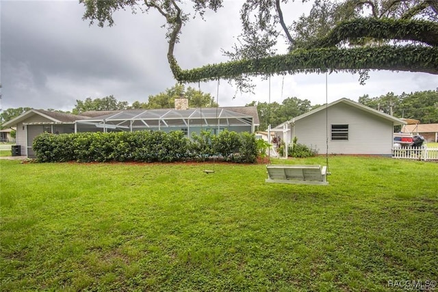 view of yard with a lanai