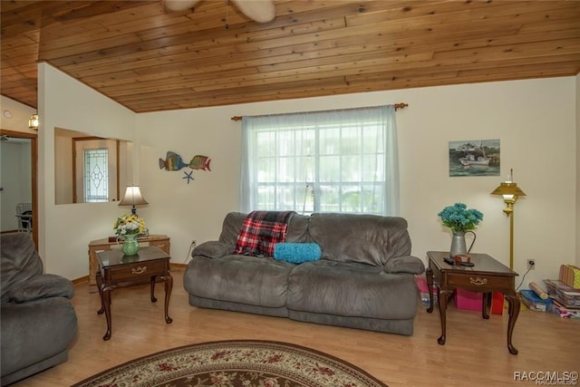 living room featuring hardwood / wood-style flooring, wooden ceiling, and vaulted ceiling