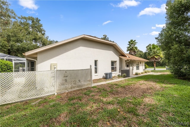 exterior space with a yard