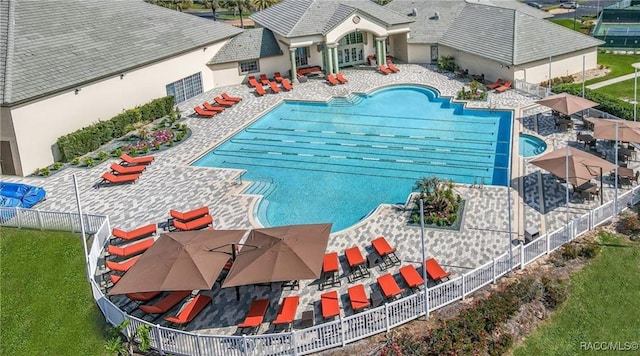 view of swimming pool with a patio