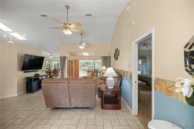 living room with high vaulted ceiling