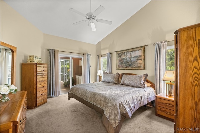 carpeted bedroom with high vaulted ceiling, ceiling fan, and access to outside