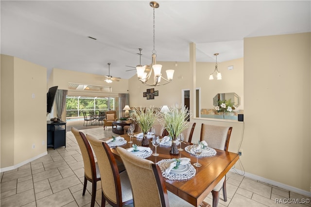 tiled dining space featuring ceiling fan with notable chandelier