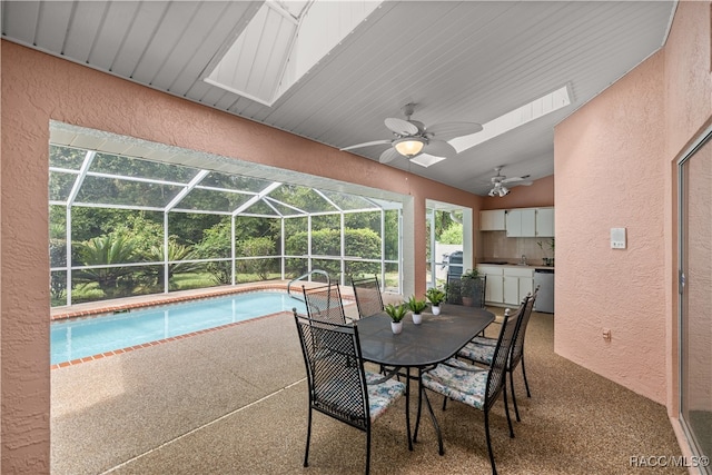 view of pool with ceiling fan