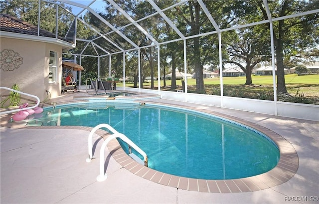 view of pool with a lanai and a patio