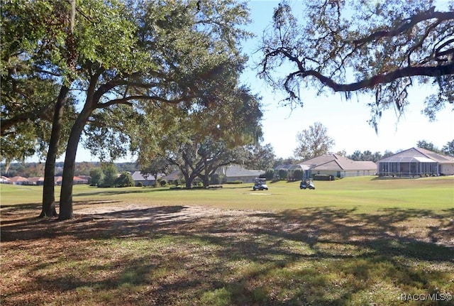 view of home's community featuring a lawn