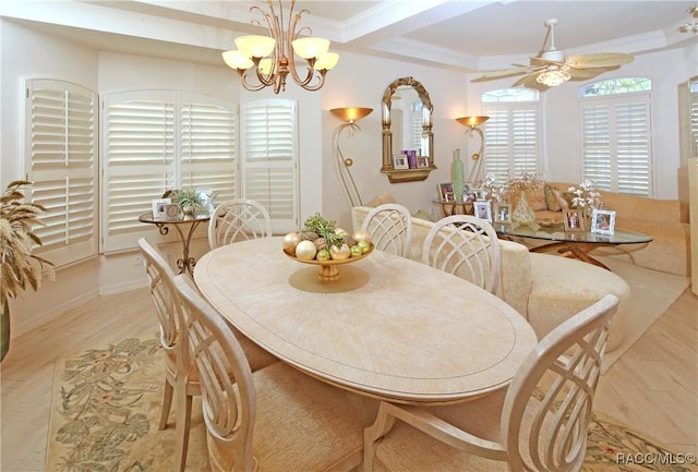 dining room featuring beamed ceiling, ceiling fan with notable chandelier, light hardwood / wood-style floors, and crown molding