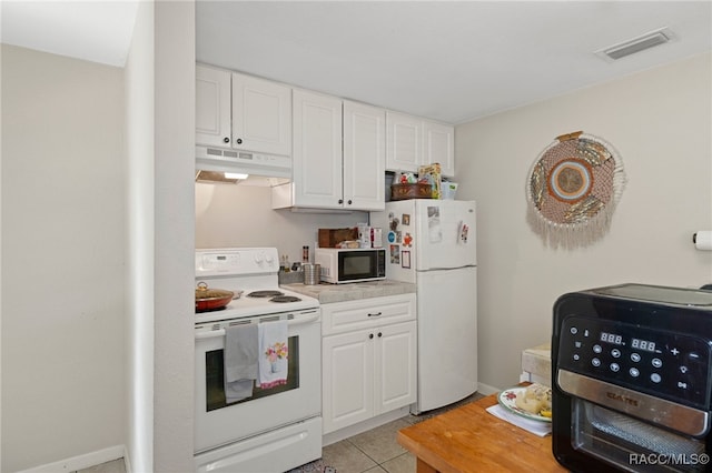 kitchen featuring light countertops, white appliances, white cabinets, and under cabinet range hood