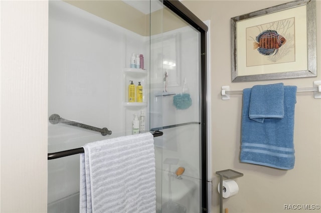 bathroom featuring a shower stall