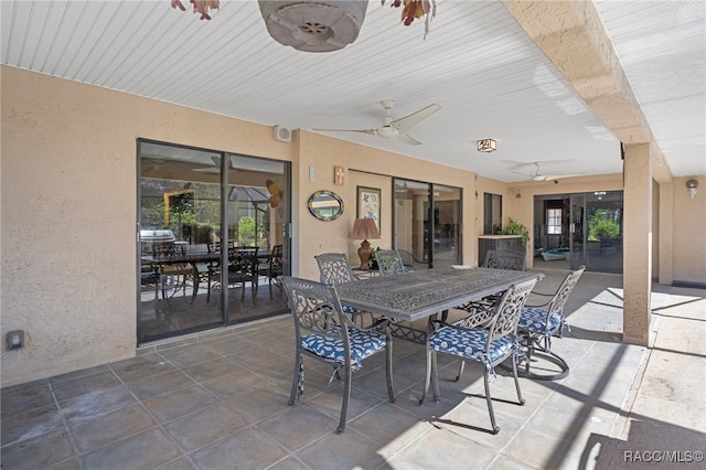 view of patio featuring ceiling fan