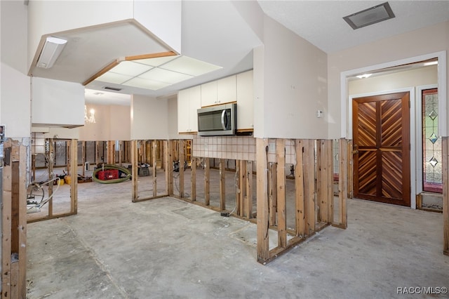 kitchen with white cabinets