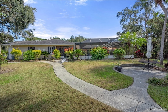 single story home with a patio, a front lawn, and a lanai