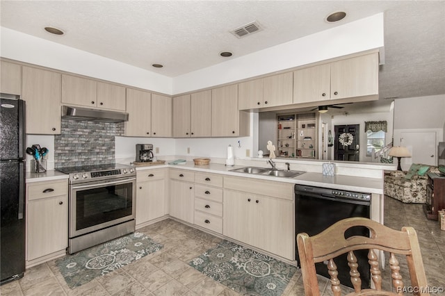 kitchen with sink, black appliances, and light brown cabinets