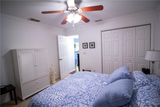 bedroom with ceiling fan and ornamental molding