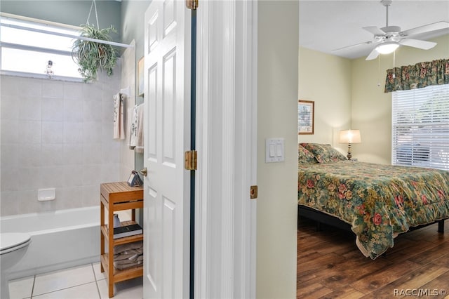 bedroom featuring ceiling fan and wood-type flooring