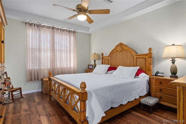 bedroom featuring ceiling fan and dark hardwood / wood-style flooring