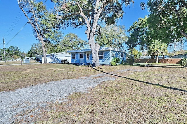 view of front of property with a front yard