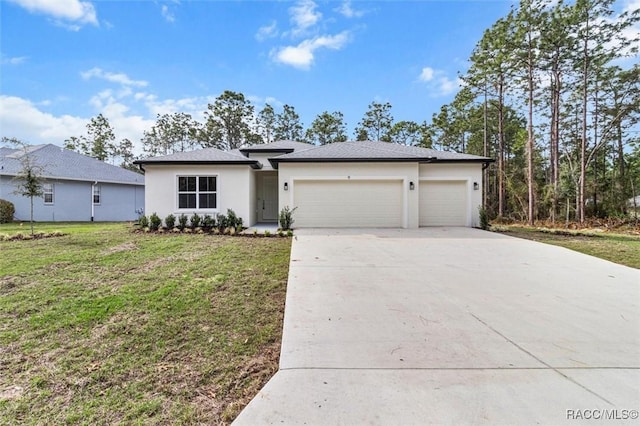 view of front of house with a garage, stucco siding, driveway, and a front yard