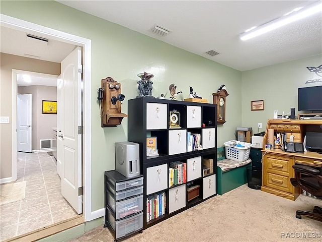 office space featuring visible vents and baseboards