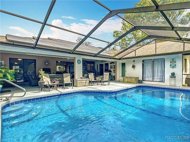 pool with a patio area