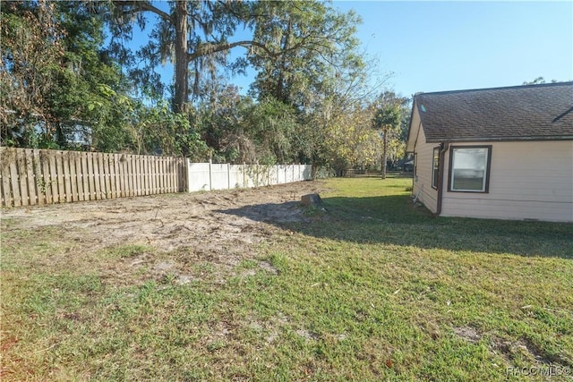 view of yard featuring fence private yard