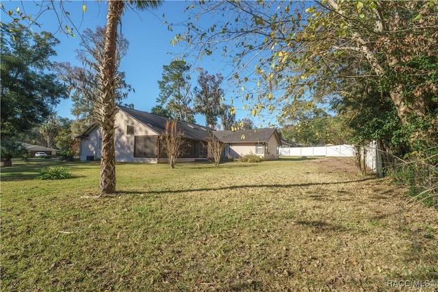 view of yard featuring fence