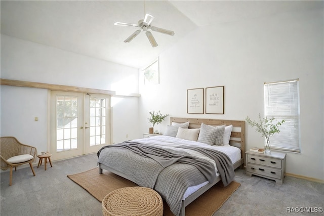 carpeted bedroom featuring high vaulted ceiling, access to outside, french doors, and a ceiling fan