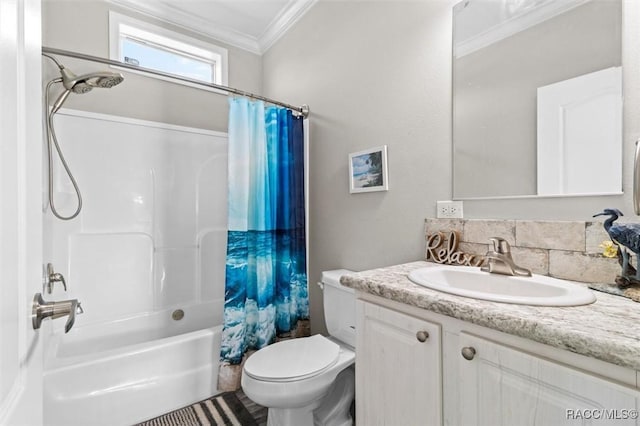 bathroom with ornamental molding, vanity, toilet, and shower / bath combo with shower curtain