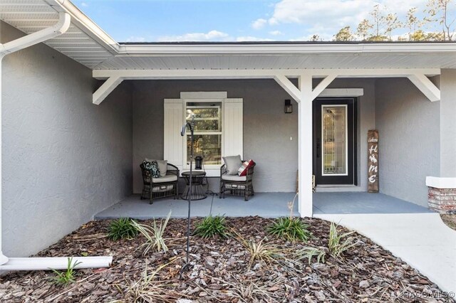 property entrance with a porch