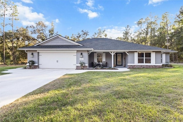 single story home with a front yard and a garage