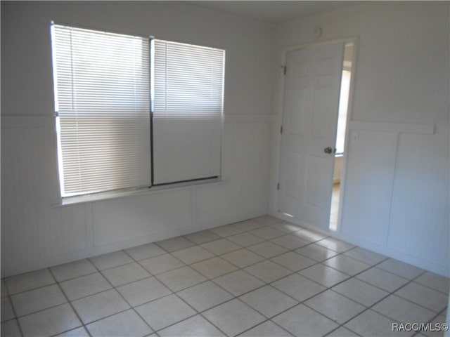 view of tiled spare room