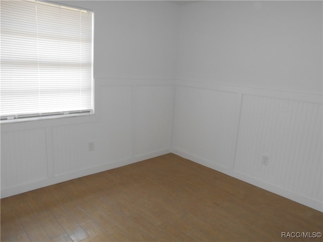 empty room featuring hardwood / wood-style floors