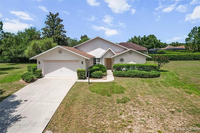 2739 N Brentwood Cir, Lecanto, FL 34461 - single story home with a garage, a front lawn, driveway, and stucco siding