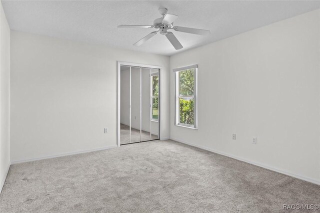 2739 N Brentwood Cir, Lecanto, FL 34461 - carpeted spare room with baseboards and a ceiling fan