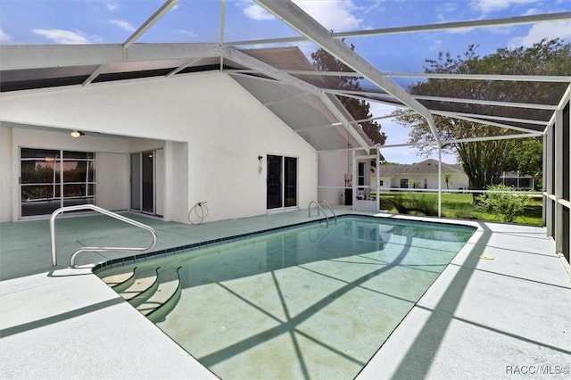 2739 N Brentwood Cir, Lecanto, FL 34461 - outdoor pool featuring a patio and glass enclosure