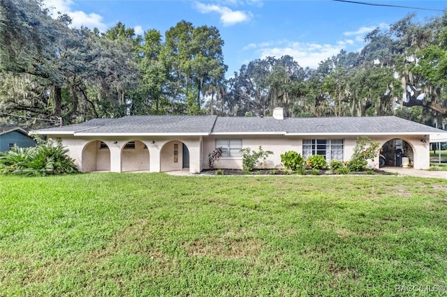 ranch-style house with a front yard