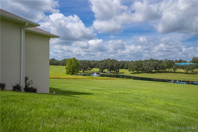 view of yard with a water view